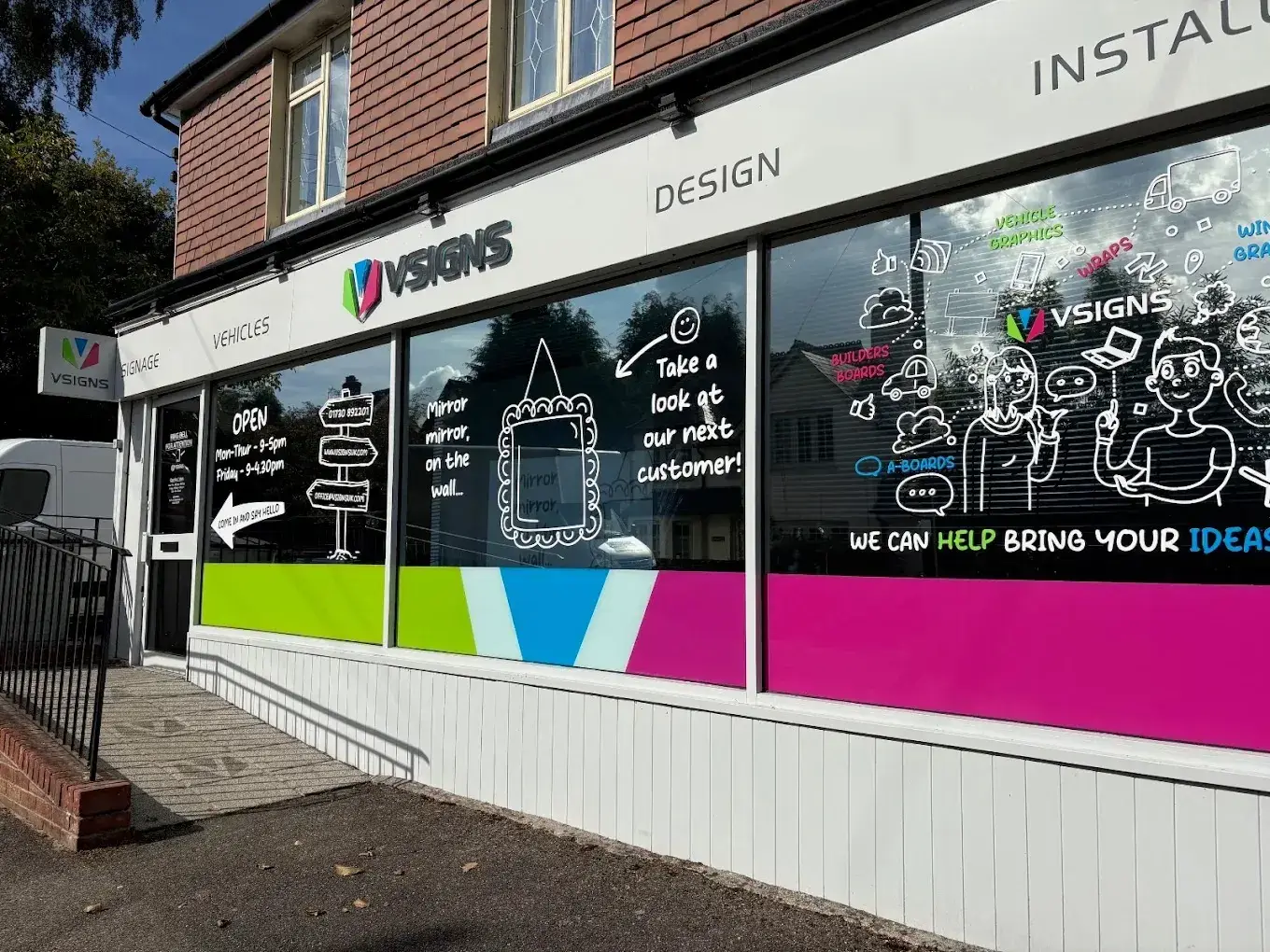 The V Signs shopfront with window graphics in Rake, Hampshire