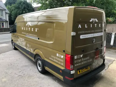 Alitex VW Crafter van in printed olive, full wrap, rear quarter showing greenhouse graphics both sides