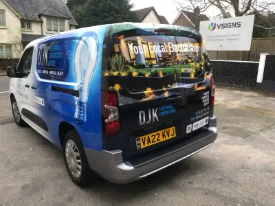 DJK Electrical van rear, full wrap reading Your Local Electricians, beside a VSIGNS board