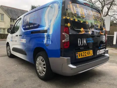 DJK Electrical Contractors van, full wrap, rear quarter with lightbulb and garden graphics