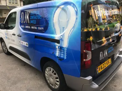 DJK Electrical Contractors van, full wrap, right side with large lightbulb graphic