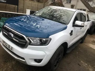 White Ford Ranger pickup, Eavoak part wrap, front view with blue Eavoak bonnet graphic