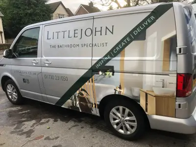 Driver side of silver VW Transporter with Littlejohn The Bathroom Specialist part wrap and signwriting