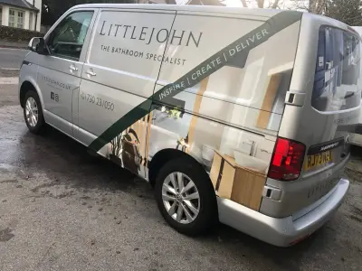 Silver VW Transporter with Littlejohn The Bathroom Specialist signwriting and bathroom photo part wrap