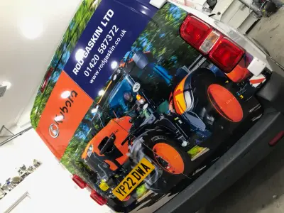 Rear doors of Rod Gaskin Ltd van wrapped with Kubota tractor graphics and branding