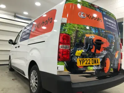 White van rear graphics showing Kubota tractor and Rod Gaskin Ltd branding, side angle