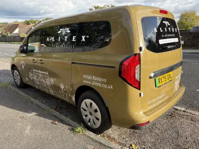 Rear quarter of an Alitex Glasshouses van in printed olive with white greenhouse line-drawing graphics