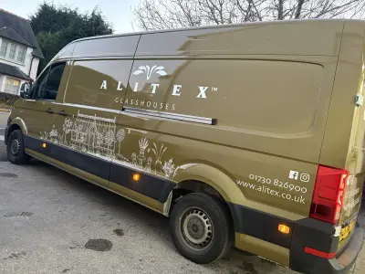 Side of a large VW Crafter van in printed Alitex olive with Alitex Glasshouses full wrap and line art