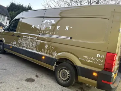 Side of a VW Crafter van in printed Alitex olive, Alitex Glasshouses wrap with greenhouse illustrations