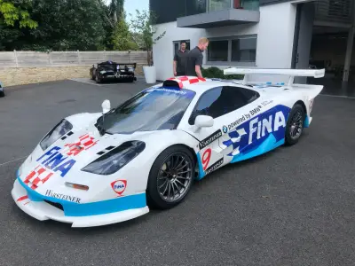 White and blue FINA Warsteiner McLaren F1 GTR number 9 front three-quarter outdoors