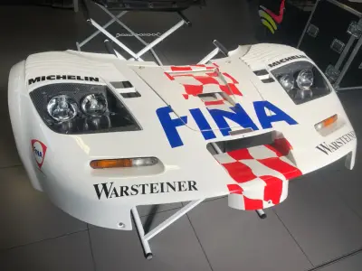Front clamshell of white FINA Warsteiner McLaren F1 GTR on stand, Michelin decals