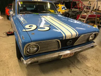 Blue Plymouth Barracuda front with white number 95 roundel and racing stripes