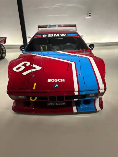 Red BMW M1 Procar number 67 front, blue stripe, BMW and Bosch livery