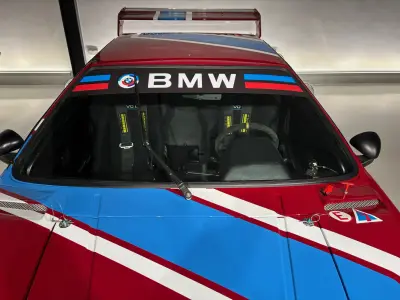 BMW M1 race car windscreen banner with BMW motorsport livery close-up