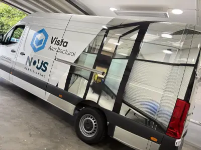 White Mercedes Sprinter with Vista Architectural and NOUS Partitioning glass-partition wrap