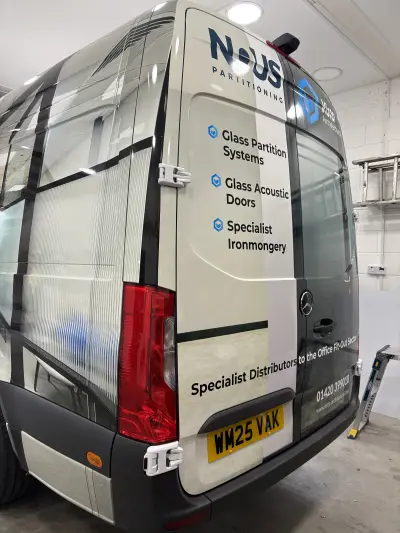 Rear doors of a Mercedes Sprinter wrapped for Vista Architectural with NOUS Partitioning glass partition services