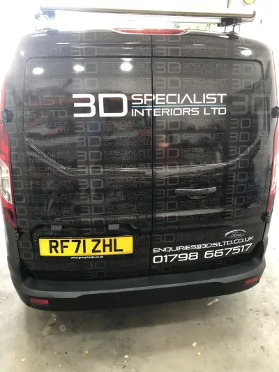 Rear doors of black Ford Transit Custom wrapped with 3D Specialist Interiors Ltd graphics