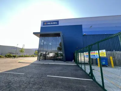 MSL Global blue warehouse with navy fascia sign above the glazed entrance