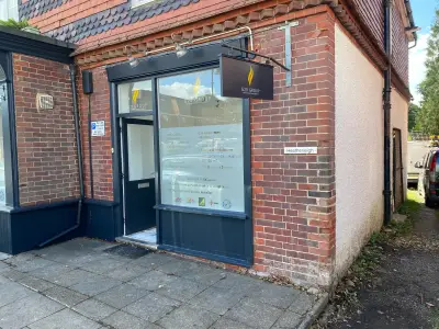 G20 Group shopfront window graphic and hanging sign listing building and gas services