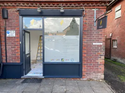 G20 Group shopfront window graphic listing new builds, gas appliances and installations