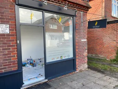 G20 Group shopfront window graphic and hanging sign listing property services