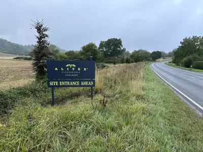 Alitex Glasshouses navy Site Entrance Ahead board on a verge beside a country road