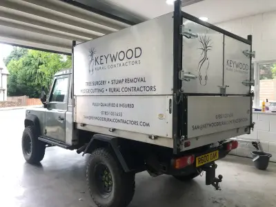 White Land Rover Defender arborist truck signwritten for Keywood Rural Contractors