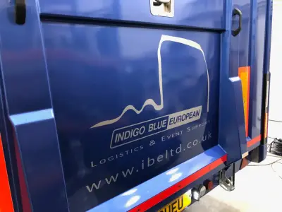 Blue trailer rear door with Indigo Blue European lorry-outline logo graphic