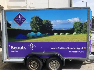 Box trailer full wrap in blue and purple for 1st Liss Scout Group with camping photo