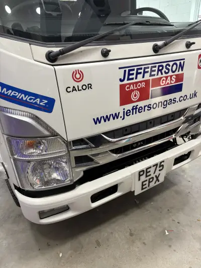 White truck front with Jefferson Calor Gas and Campingaz signwriting graphics