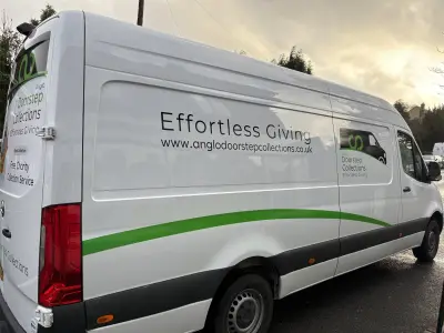 Silver Mercedes Sprinter van side with Anglo Doorstep Collections Effortless Giving graphics