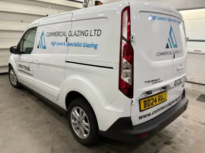 White Ford Transit Connect van with Commercial Glazing Ltd High Level Specialist Glazing graphics