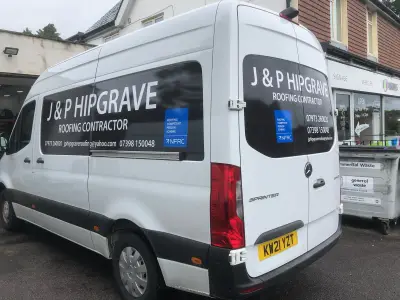 White Mercedes Sprinter van with J & P Hipgrave Roofing Contractor window and side graphics