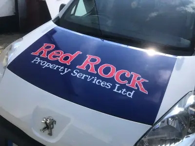 White Peugeot van bonnet with blue and red Red Rock Property Services Ltd graphic