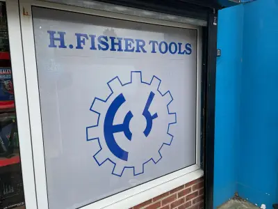H. Fisher Tools frosted window graphic with blue cog logo and lettering