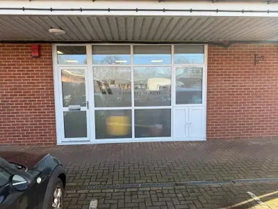 Westlake 'Consider it done' frosted logo graphic on glazed office entrance door