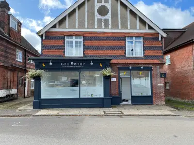 G20 Group shopfront with frosted window graphics on Hampshire high street building