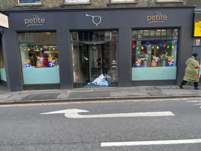 Petite Patisserie shopfront with festive gift-box and fairy-light window graphics