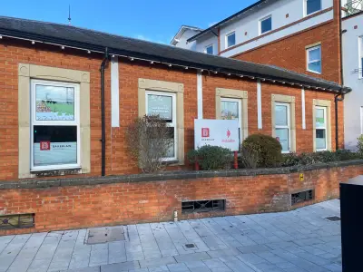 Bakerlaw Solicitors and Fish Saltus offices with painted winter-scene window graphics
