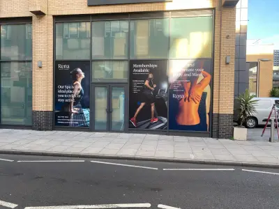 Rena Health & Leisure spa and gym window graphics across a hotel storefront's glazing