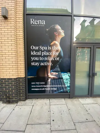 Rena spa window graphic panel reading Our Spa is the ideal place to relax