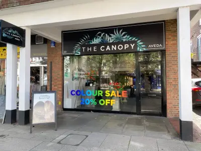 The Canopy Aveda salon fascia sign and rainbow Colour Sale 20% Off window graphics